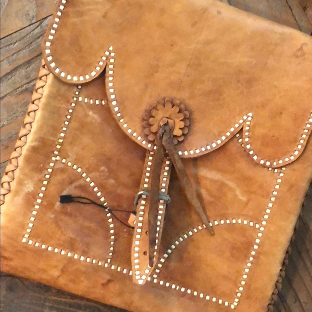 Vintage handmade, whipstitch leather bag.